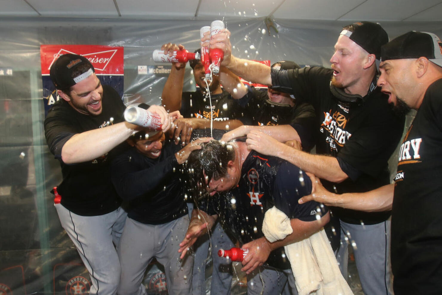 The Houston Astros celebrate in the clubhouse 