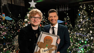 Ryan Seacrest Presents Ed Sheeran With a Ginger Gingerbread Man and OMG