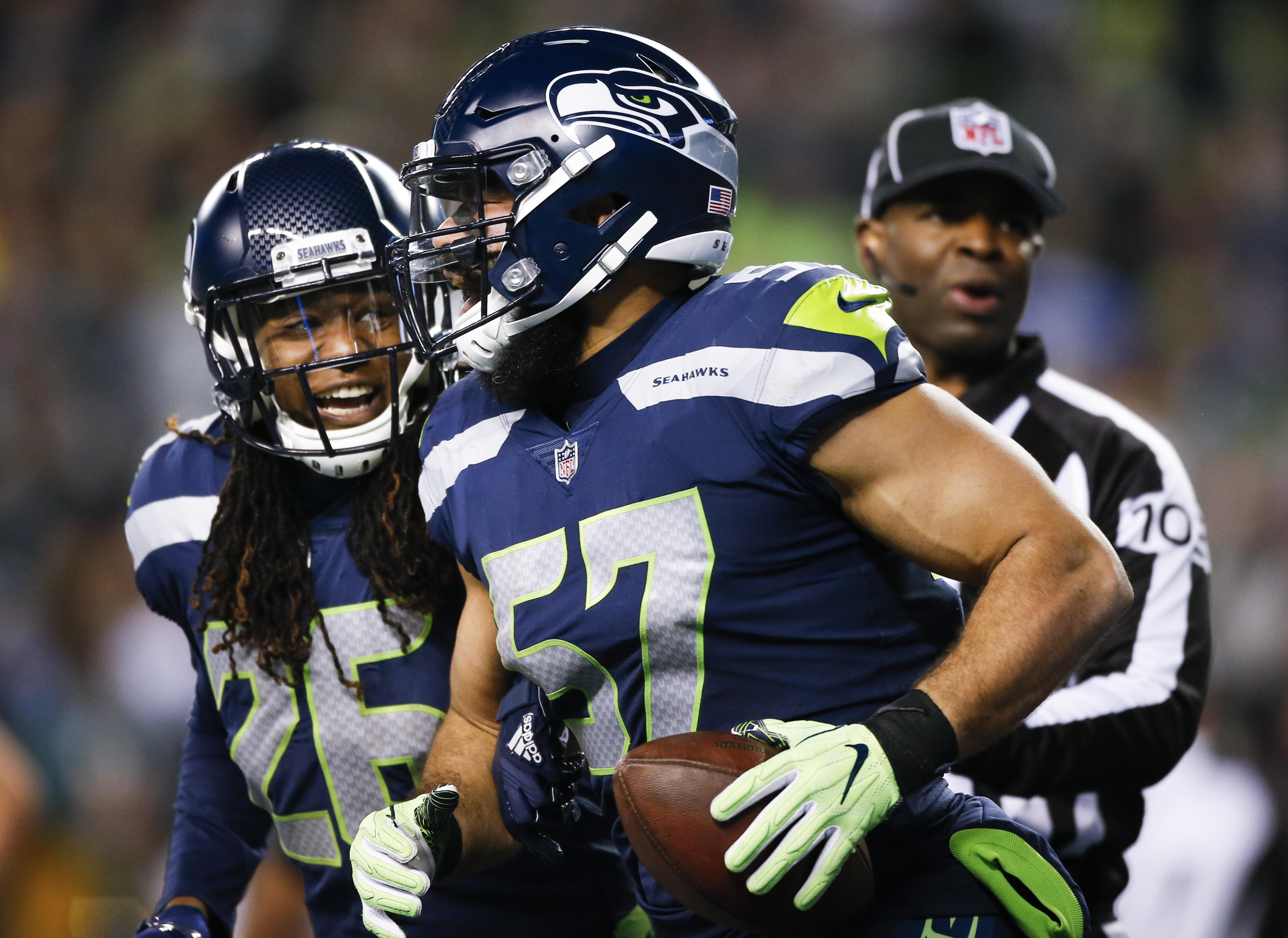 SEATTLE, WA - DECEMBER 03: Linebacker Michael Wilhoite #57 of the Seattle Seahawks celebrates the Eagles touchback with Shaquill Griffin #26 with in the third quarter at CenturyLink Field on December 3, 2017 in Seattle, Washington. (Photo by Otto Greule Jr /Getty Images)