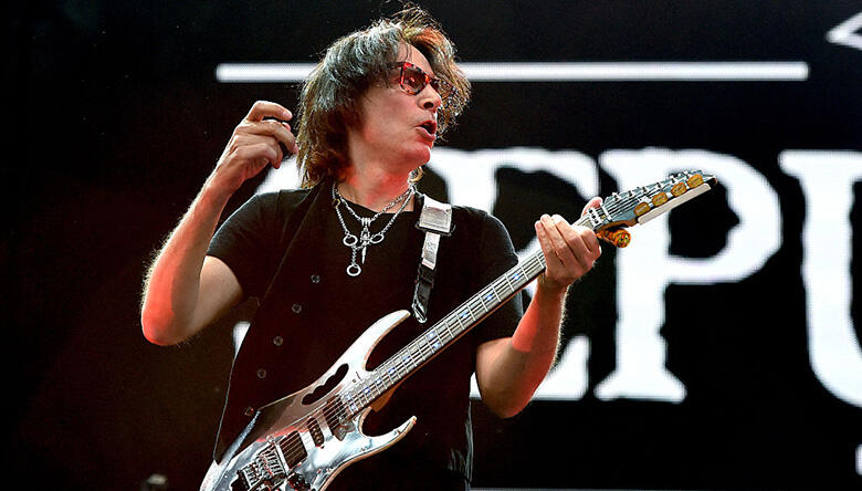 Steve Vai Reveals One Rock Guitarist He'd Take Lessons From | iHeart