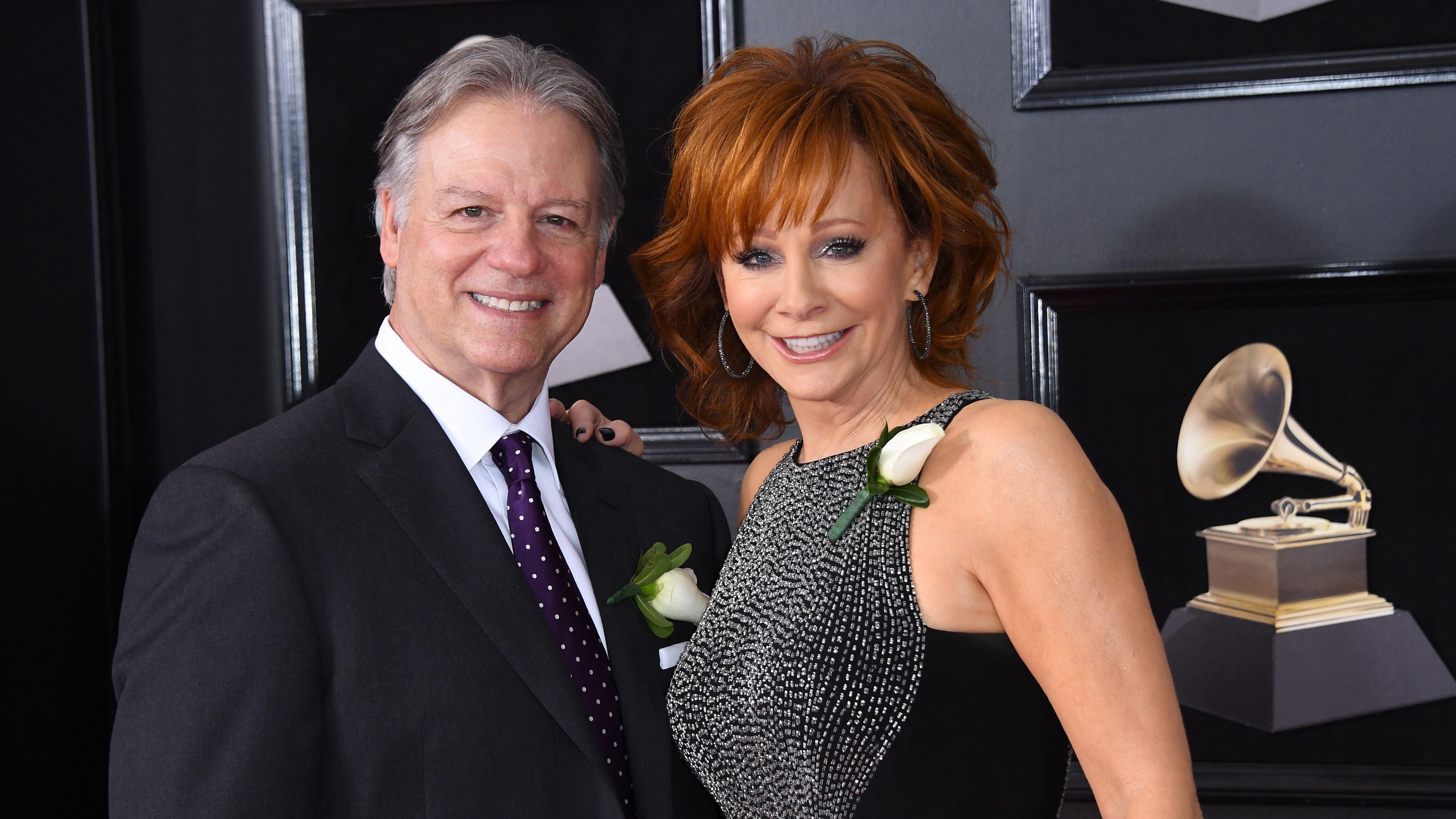 Reba Steps Out with New Man at the Grammys | iHeart