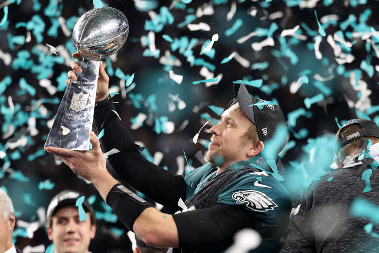 Nick Foles #9 of the Philadelphia Eagles celebrates with the Vince Lombardi Trophy after ...