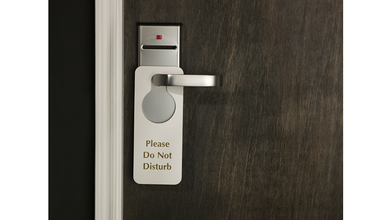 Generic Do Not Disturb Sign Hotel Room Door (Credit: Getty Images)