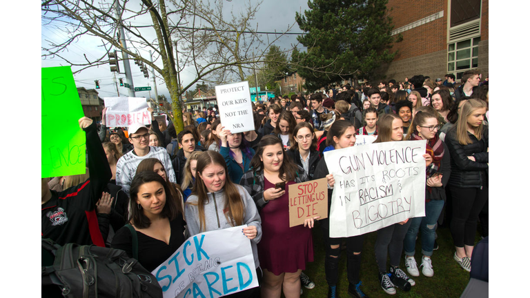 Students at Ballard High School participate in a walkout to address school safety and gun violence on March 14, 2018 in Seattle, Washington. Students across the nation walked out of their classrooms for 17 minutes to show solidarity for the 17 killed in the February 14 attack at Marjory Stoneman Douglas High School and to make a nationwide appeal for changes in gun laws. (Photo by Karen Ducey/Getty Images)