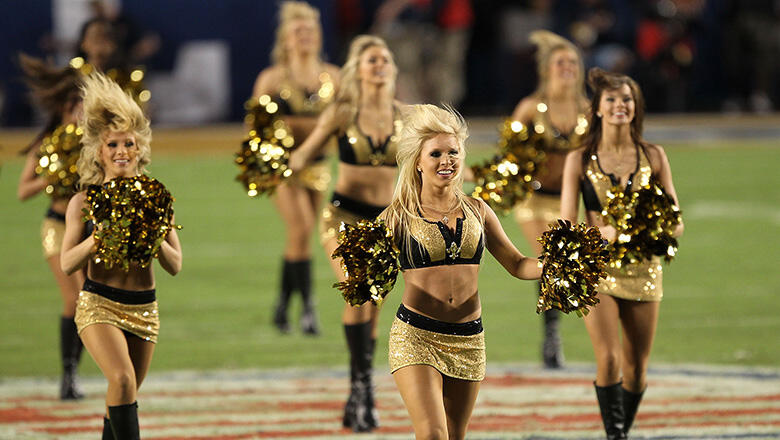 The Talk - A New Orleans Saints cheerleader was fired for posting a photo  of herself in a one-piece bathing suit on social media. According to the  Saints handbook, cheerleaders cannot appear