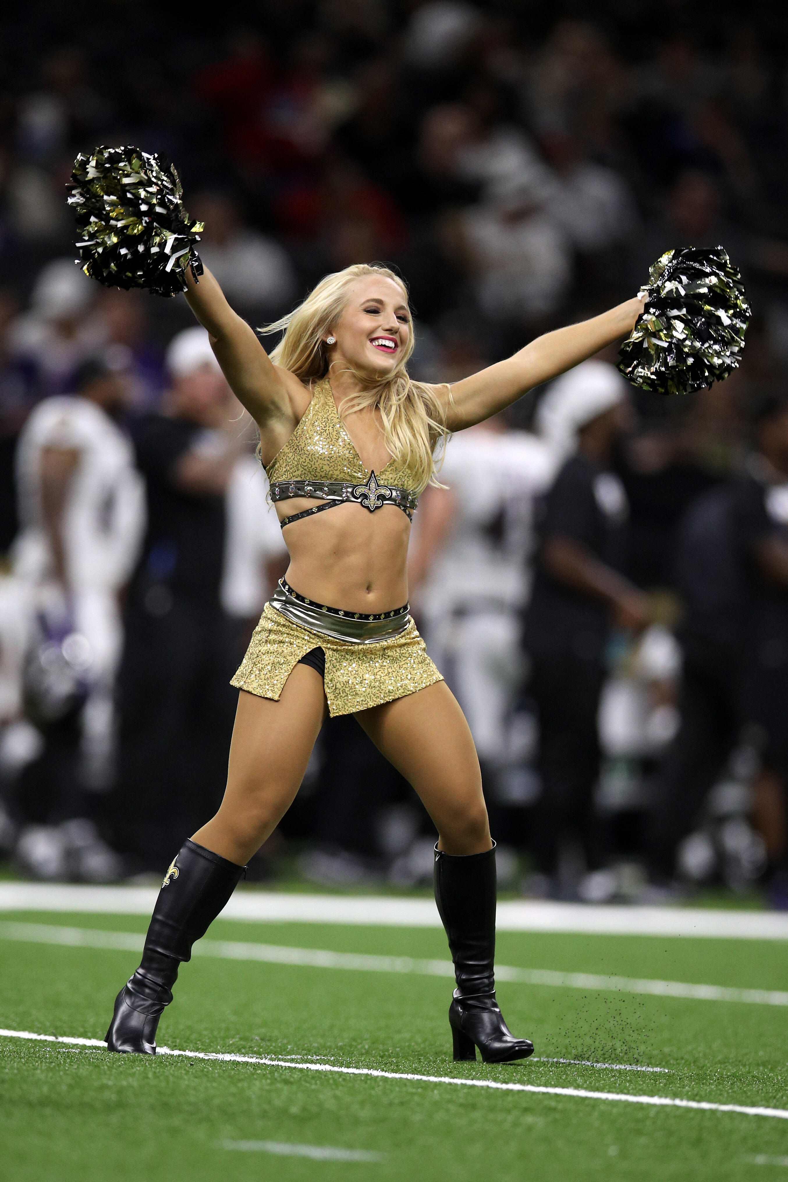 NFL cheerleader says New Orleans Saints fired her over racy photo