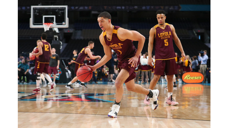 Lucas Williamson #1 of the Loyola Ramblers handles the ball during practice