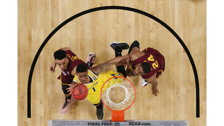 Charles Matthews #1 of the Michigan Wolverines drives to the basket 