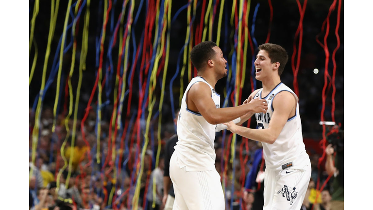 Jalen Brunson #1 and Collin Gillespie #2 of the Villanova Wildcats celebrate 