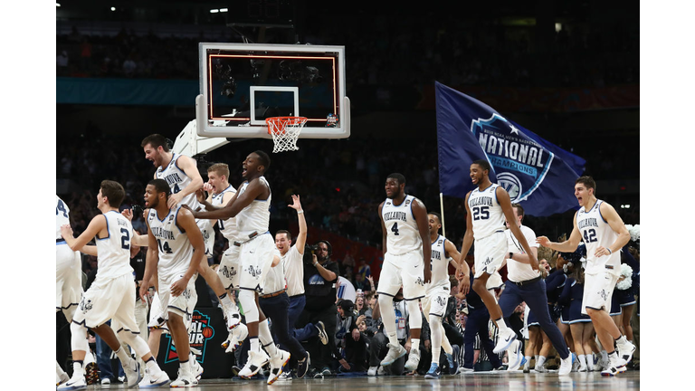 The Villanova Wildcats celebrate after defeating the Michigan Wolverines 