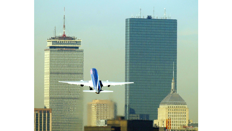 An American Airlines flight takes off from Boston (Credit C.J. Hunther/AFP/Getty Images)