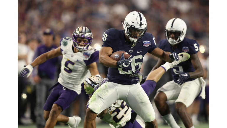 GLENDALE, AZ - DECEMBER 30: Running back Saquon Barkley #26 of the Penn State Nittany Lions rushes the football against the Washington Huskies during the second half of the Playstation Fiesta Bowl at University of Phoenix Stadium on December 30, 2017 in Glendale, Arizona. The Nittany Lions defeated the Huskies 35-28. (Photo by Christian Petersen/Getty Images)