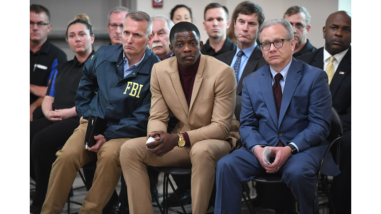 NASHVILLE, TN - APRIL 22: Waffle House patron James Shaw, Jr. (C) who stopped the shooting at a Waffle House where a gunman opened fire killing four and injuring two attends a press conference with FBI Special Agent In Charge, Matthew Espenshade (L) and Metro Nashville Mayor David Briley (right) on April 22, 2018 in Nashville, Tennessee. Shaw, Jr., 29, took action disarming the gunman and ultimately forcing him out of the Waffle House restaurant. Travis Reinking, 29, of Morton, IL, is person of interest in the shooting and is suspected to have left the scene naked. (Photo by Jason Davis/Getty Images)