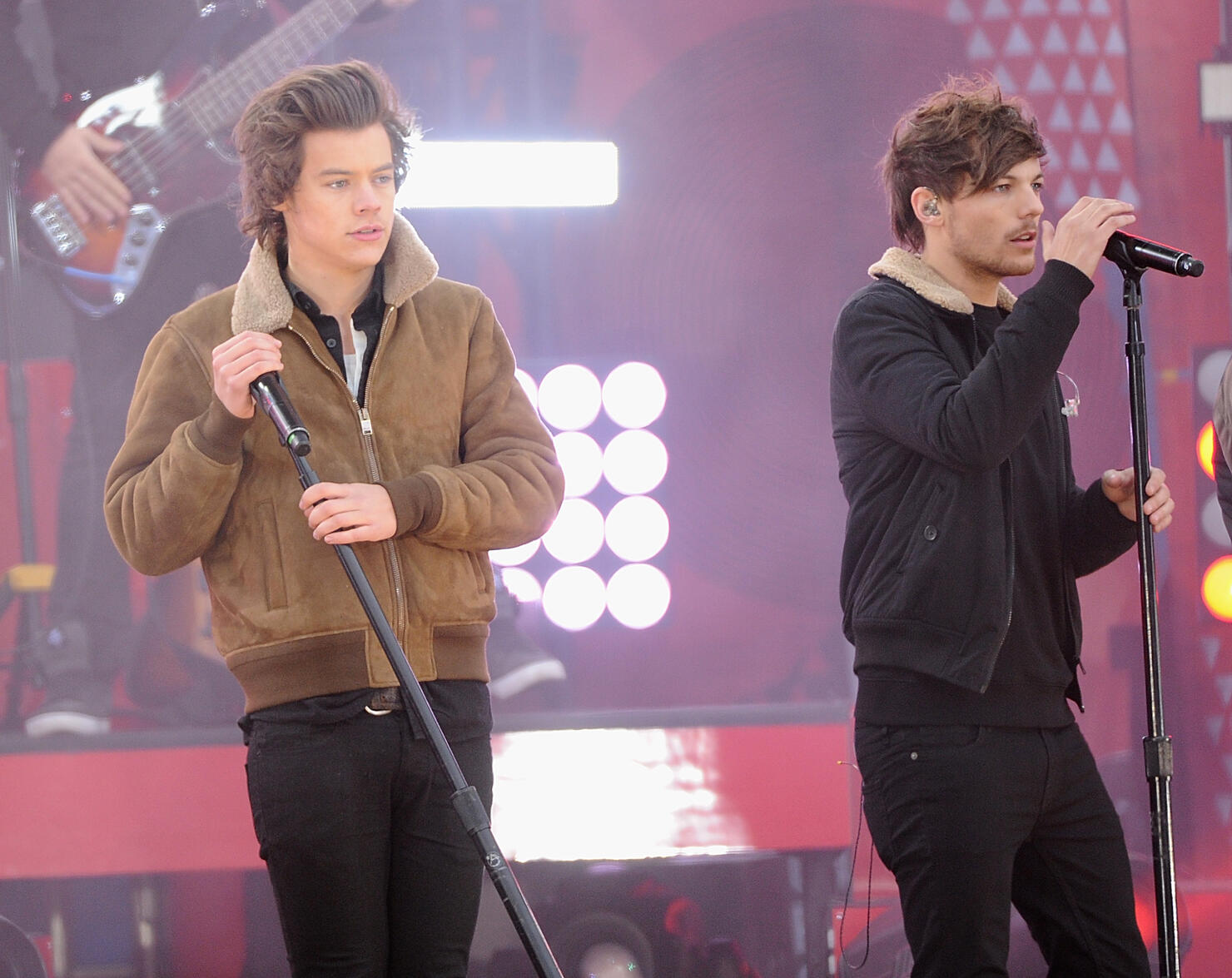 Louis Tomlinson and Harry Styles (Getty)