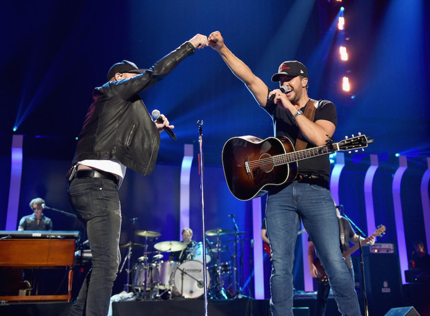 Cole Swindell and Luke Bryan perform during iHeartCountry Festival