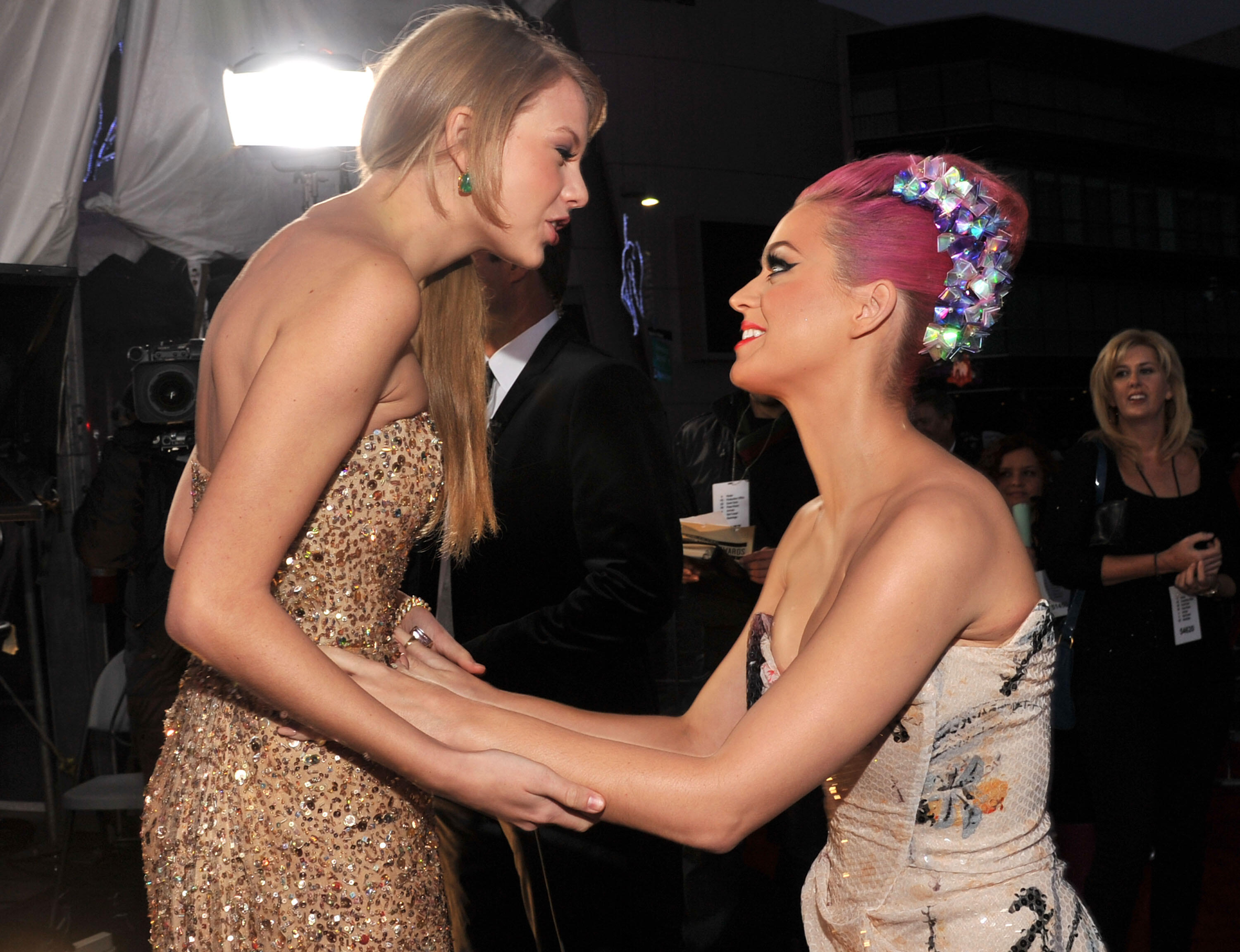 Katy Perry Sends Taylor Swift an Olive Branch — Literally! iHeartRadio