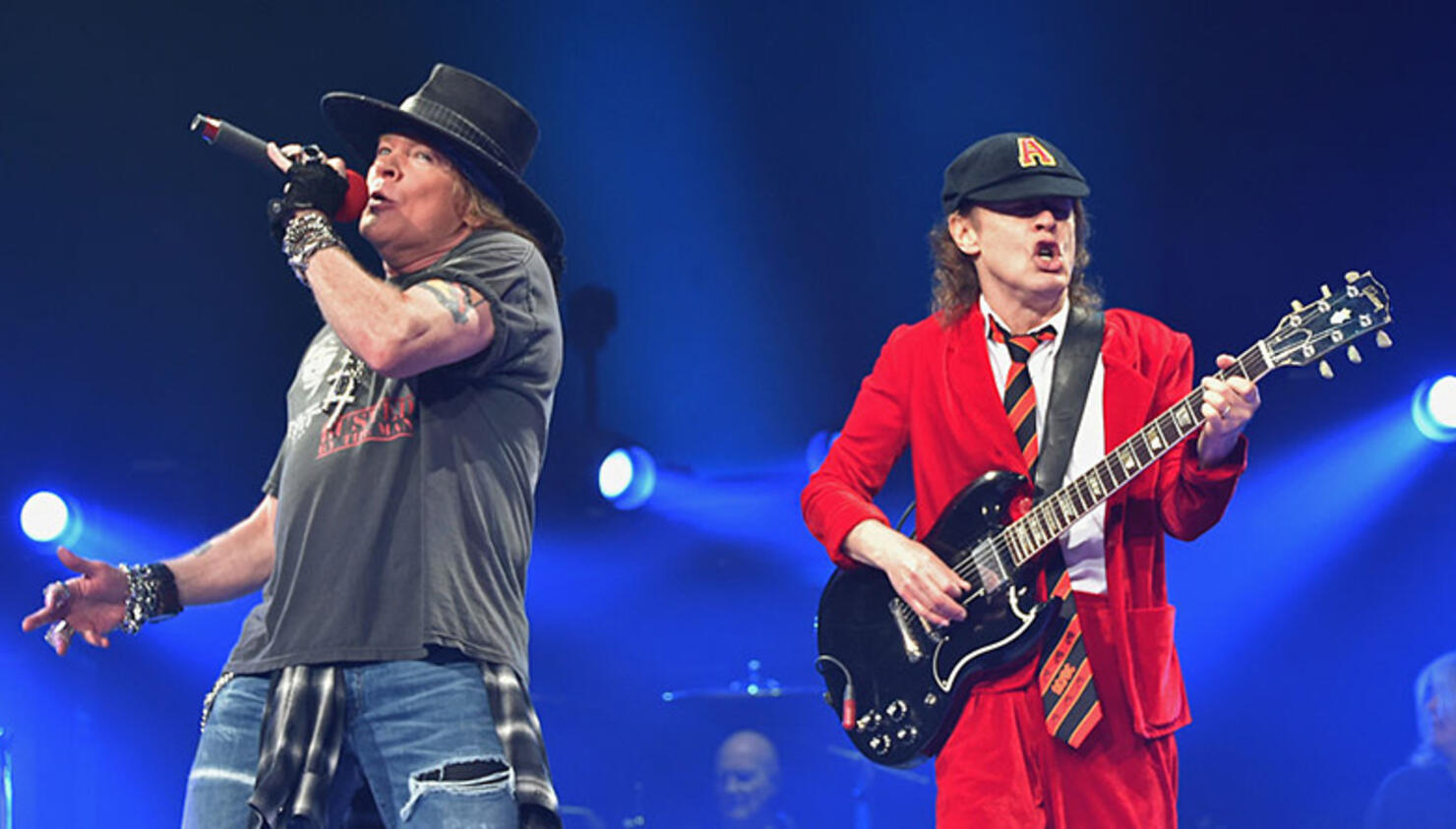 munching Lada Pioner Guns N' Roses Tour Manager Instagram Post Fuels Axl Rose-AC/DC Speculation  | iHeart