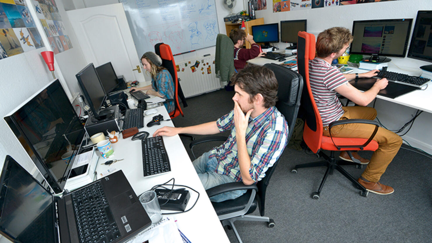 people sitting in an office