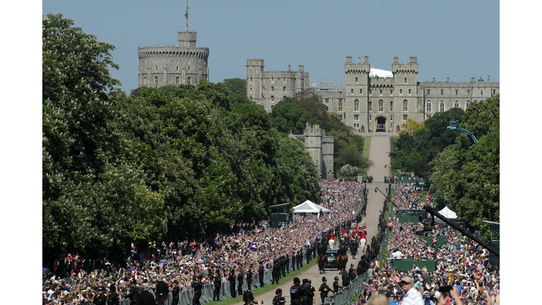 Prince Harry, Duke of Sussex and Meghan, Duchess of Sussex head up The Long Walk back into Windsor Castle 