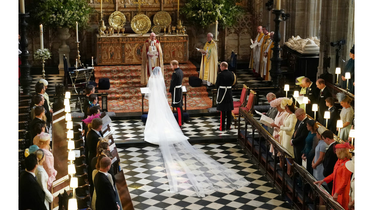 Prince Harry and Meghan Markle stand at the altar during their wedding in St George's Chapel