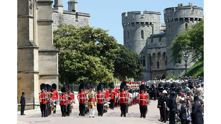 Members of The Queen's Guard march at of the wedding of Prince Harry to Meghan Markle
