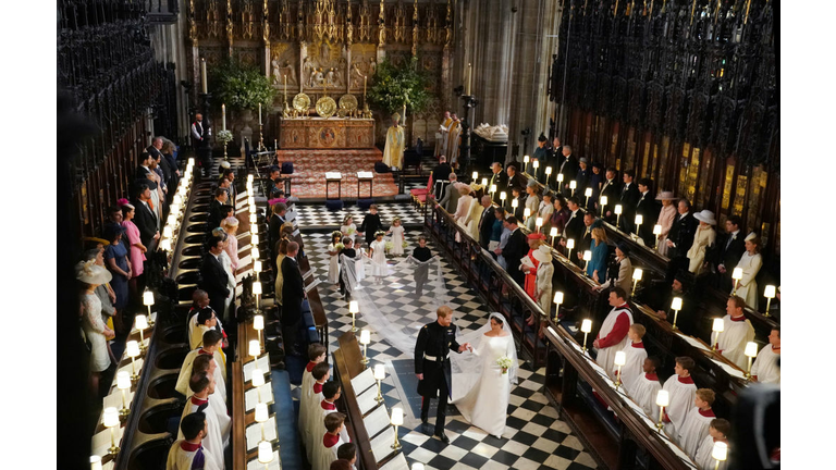 Prince Harry, Duke of Sussex and The Duchess of Sussex leave following their wedding 