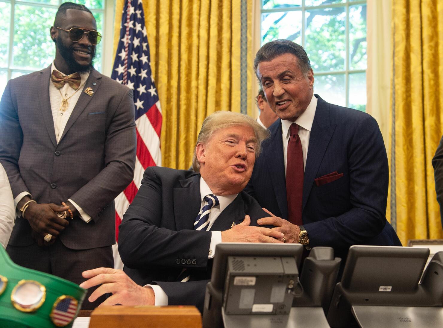 Lennox Lewis (left) with President Trump and Sylvester Stallone in the Oval Office on May 24th.