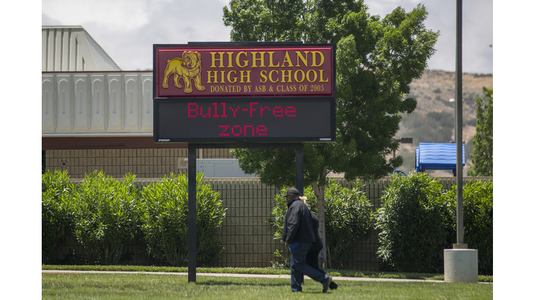 The school sign reads, 'bully-free zone', at Highland High School where a shooting occurred on May 11, 2018 in Palmdale, California.