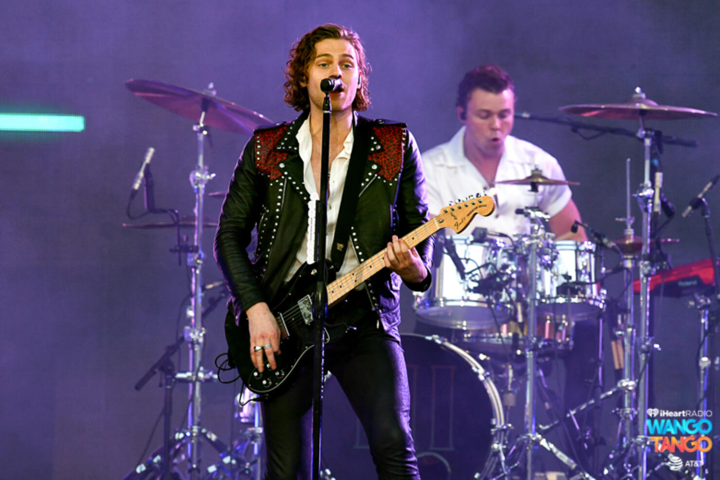 Michael Clifford, Luke Hemmings, Ashton Irwin (on drum riser), and Calum Hood of music group 5 Seconds of Summer perform onstage during the 2018 iHeartRadio Wango Tango by AT&T at Banc of California Stadium on June 2, 2018 in Los Angeles, California.