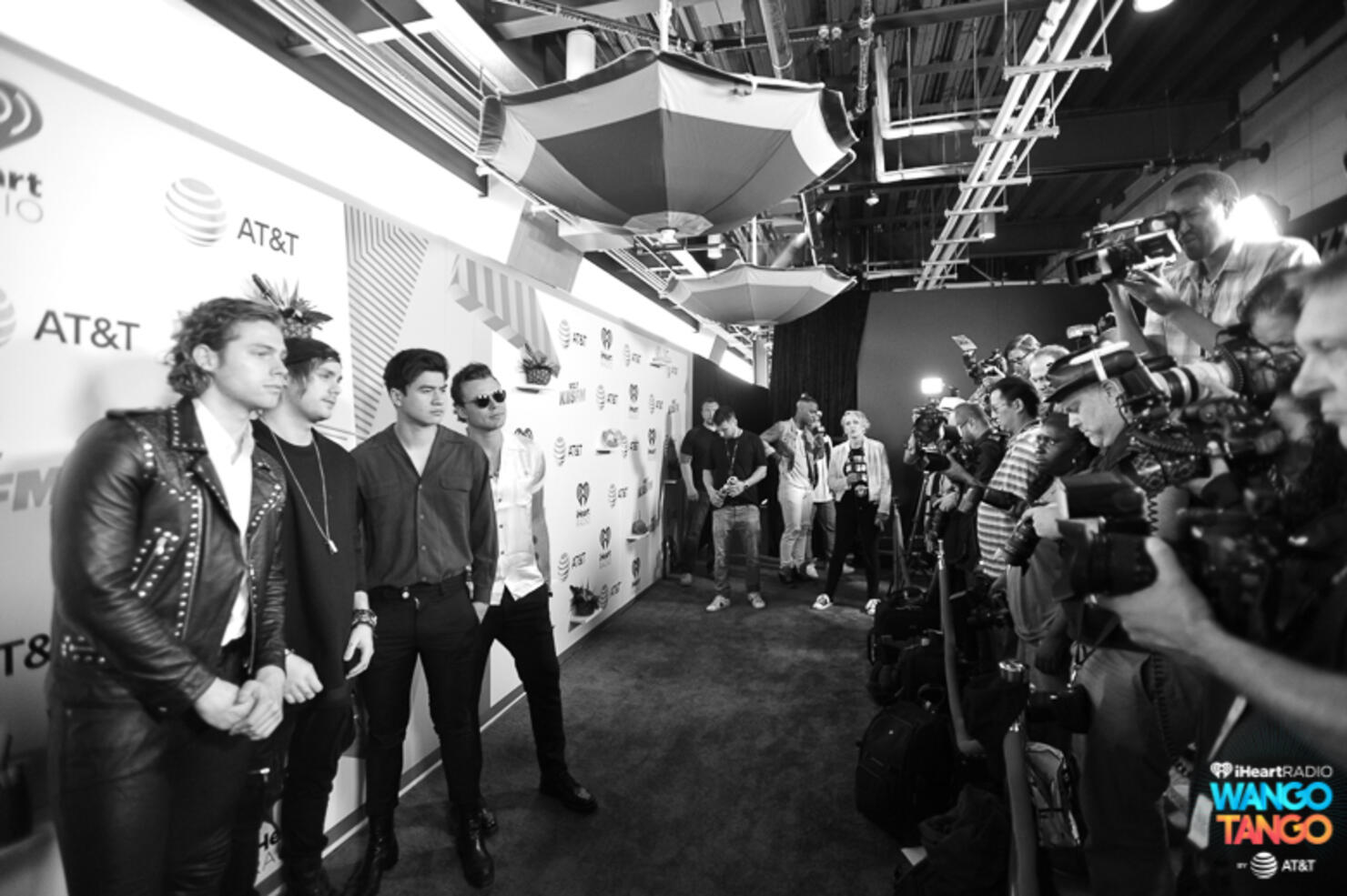  Ashton Irwin, Michael Clifford, Calum Hood and Luke Hemmings of 5 Seconds of Summer arrive at the 2018 iHeartRadio Wango Tango by AT&T at Banc of California Stadium on June 2, 2018 in Los Angeles, California.