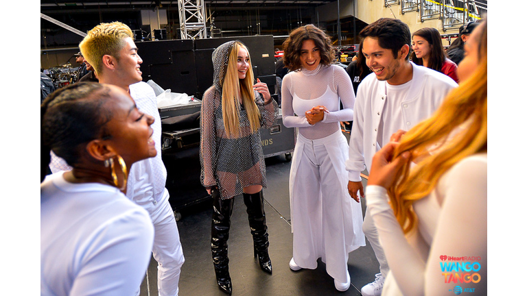 Sabrina Carpenter (C) and dancers are seen backstage at the 2018 iHeartRadio Wango Tango by AT&T at Banc of California Stadium on June 2, 2018 in Los Angeles, California