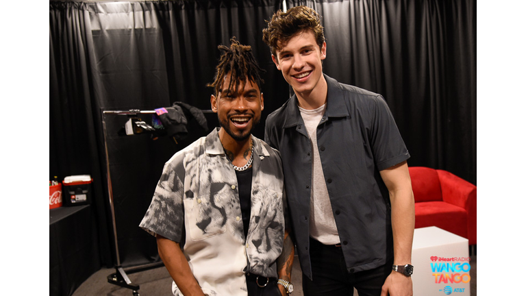 Miguel and Shawn Mendes backstage at the 2018 iHeartRadio Wango Tango by AT&T at Banc of California Stadium on June 2, 2018 in Los Angeles, California