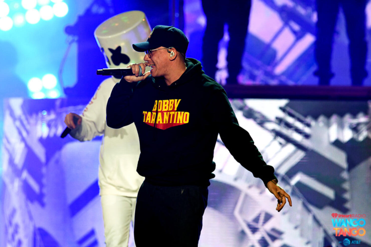 Marshmello (L) and Logic perform onstage during the 2018 iHeartRadio Wango Tango by AT&T at Banc of California Stadium on June 2, 2018 in Los Angeles, California.