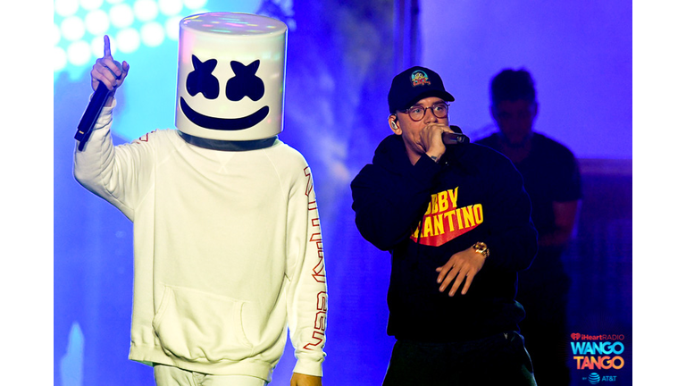 Marshmello (L) and Logic perform onstage during the 2018 iHeartRadio Wango Tango by AT&T at Banc of California Stadium on June 2, 2018 in Los Angeles, California.