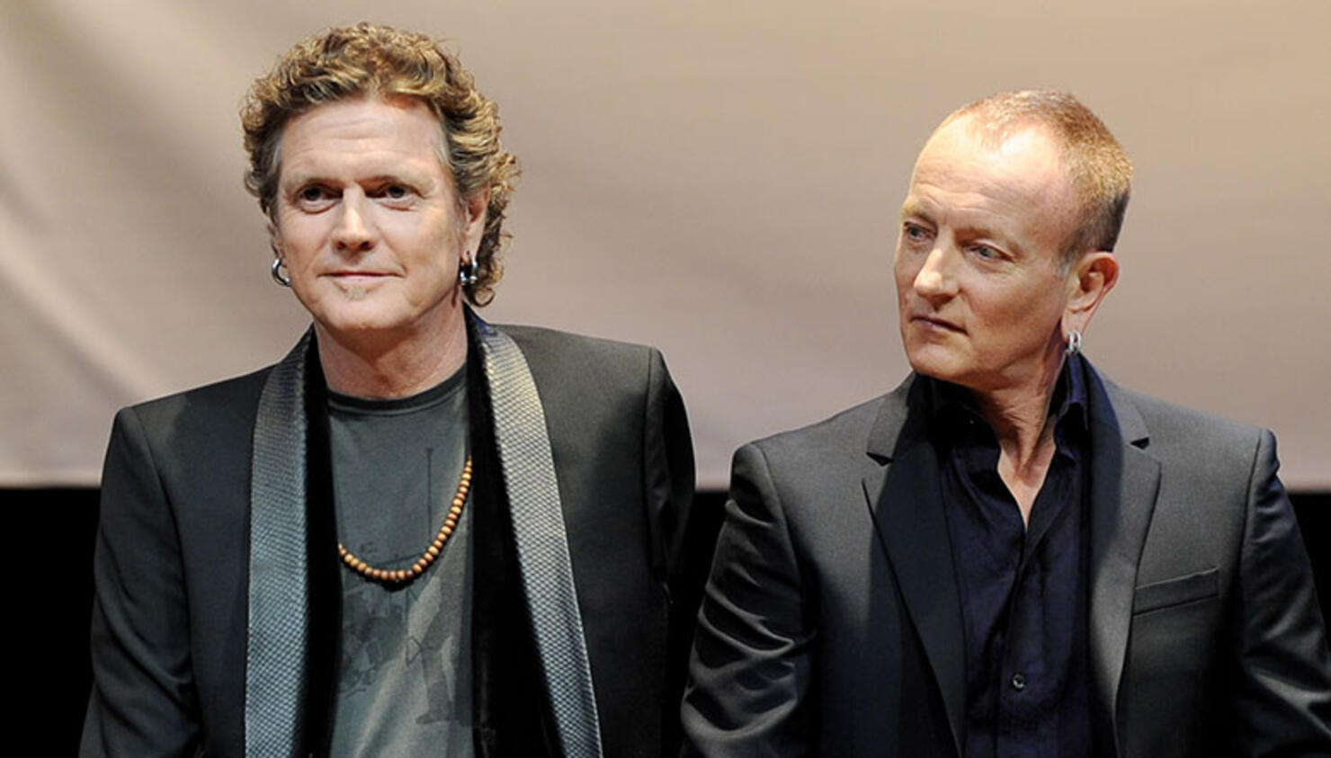 Def Leppard's Rick Allen Says Band Is "Back in the Saddle" With Phil Collen