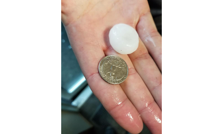 Quarter size hail reported by Iowa Storm Chasing Network's Zach Sharpe