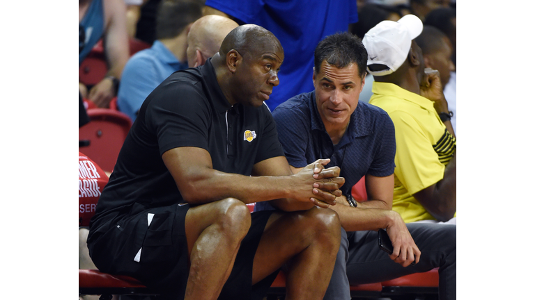 Magic Johnson and Rob Pelinka 