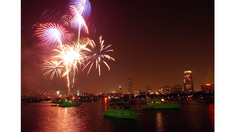  Fireworks explode over the Charles River July 4, 2003 in Boston, Massachusetts. The Boston fireworks display was chosen to be taped and broadcast to American's overseas this 4th of July. More than a half-million people came out to take in the show. (Photo by Jessica Rinaldi/Getty Images)