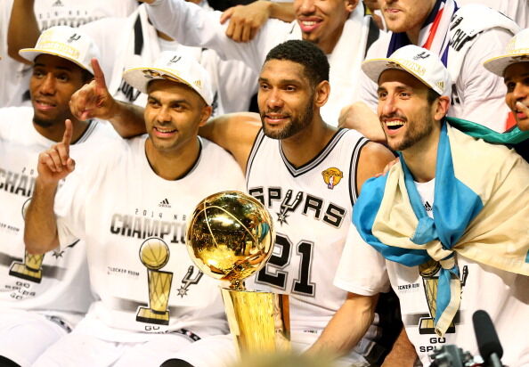  Tony Parker #9 and Tim Duncan #21, and Manu Ginobili #20 