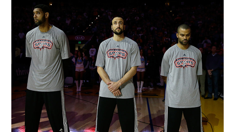 Tim Duncan #21, Manu Ginobili #20, and Tony Parker #9 