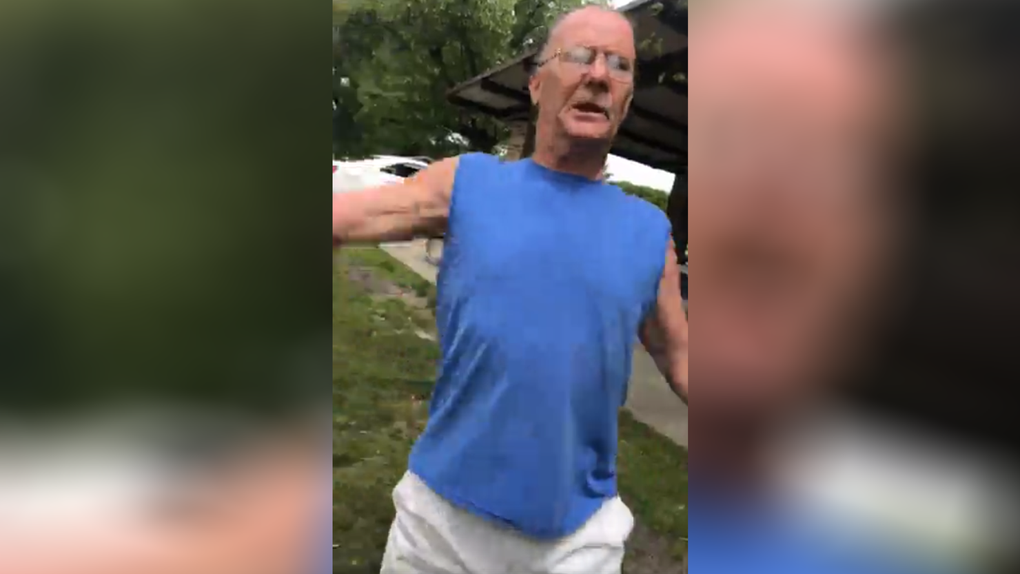 man berates woman wearing puerto rico shirt