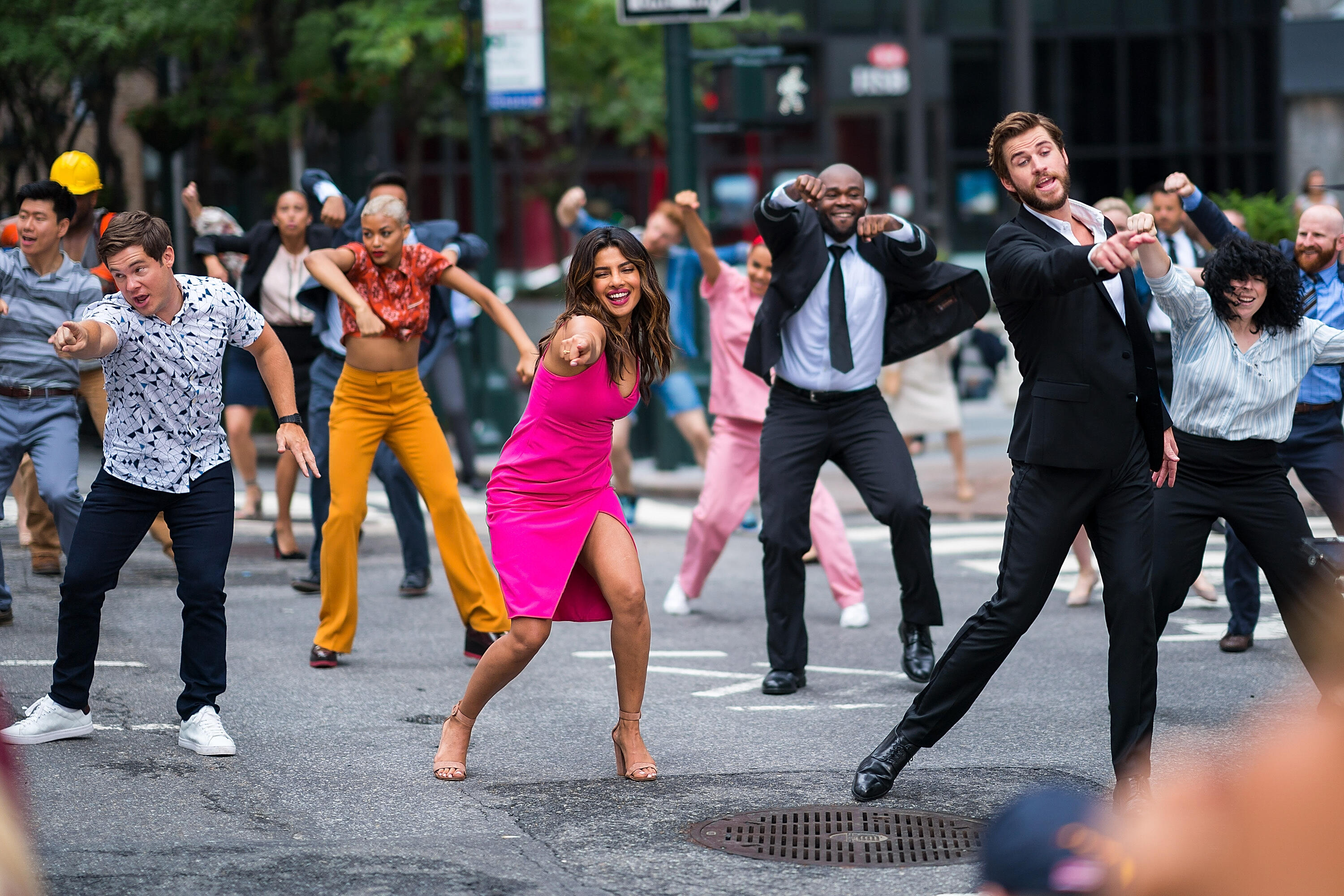 Liam Hemsworth, Rebel Wilson, and Priyanka Chopra Dance In The Street
