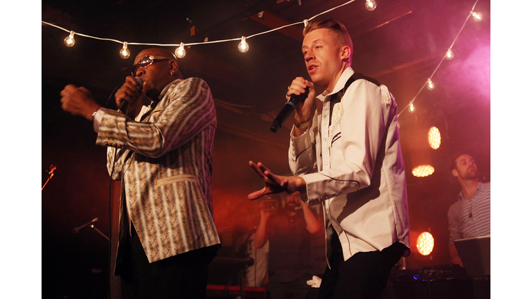 Wanz (L) and Macklemore perform onstage at the iHeartRadio Official SXSW Showcase on March 12, 2013 in Austin, Texas. (Photo by Roger Kisby/Getty Images for iHeartradio)