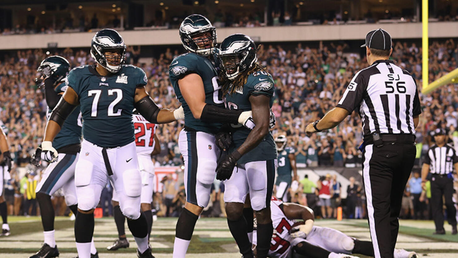 Lane Johnson #65 celebrates a two point conversion by Jay Ajayi #26 of the Philadelphia Eagles during the fourth quarter against the Atlanta Falcons at Lincoln Financial Field on September 6, 2018 in Philadelphia, Pennsylvania.