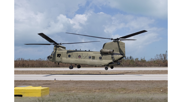 A Chinook helicopter with the Florida Army National Guard lifts fom Marathon Airport on September 13, 2017 in Marathon, Florida. The Federal Emergency Managment Agency has reported that 25-percent of all homes in the Florida Keys were destroyed and 65-percent sustained major damage when they took a direct hit from Hurricane, 2017. The Florida Keys still lacks water, electricity or mobile phone service. Residents are still not permitted to go further south than Mile Marker 73. The Federal Emergency Managment Agency has reported that 25 percent of all homes in the Florida Keys were destroyed and 65 percent sustained major damage when they took a direct hit from Hurricane Irma. GASTON DE CARDENAS/AFP/Getty Images