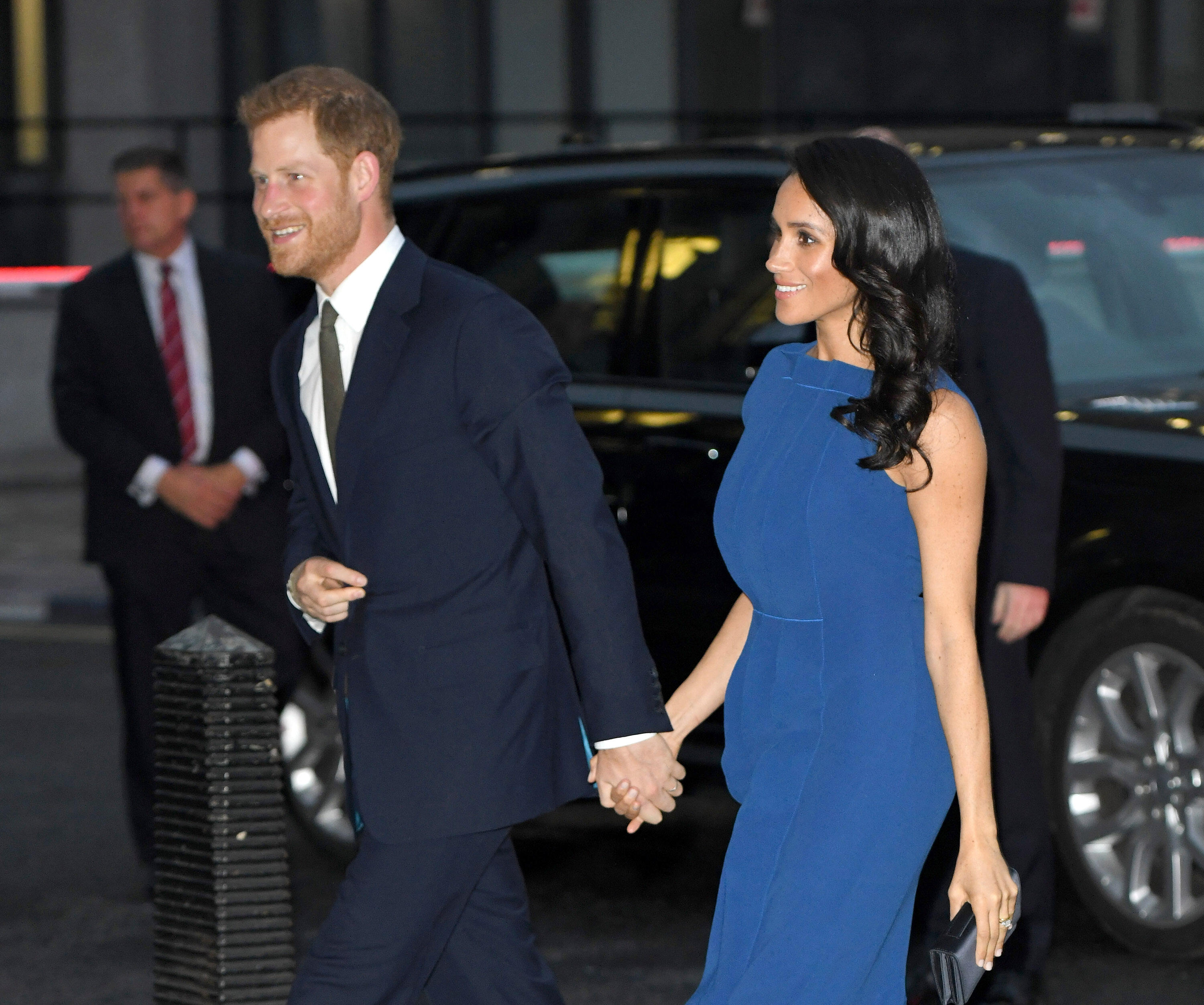 Is Meghan Markle Pregnant? This Dress Has Everyone Convinced She's Expecting | iHeartRadio