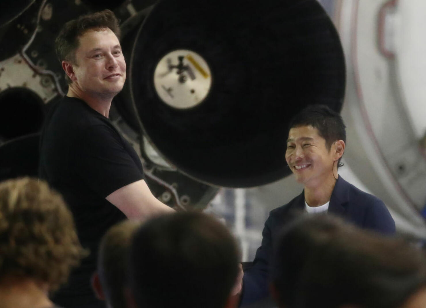 Japanese billionaire identified as first private passenger to fly around the moon