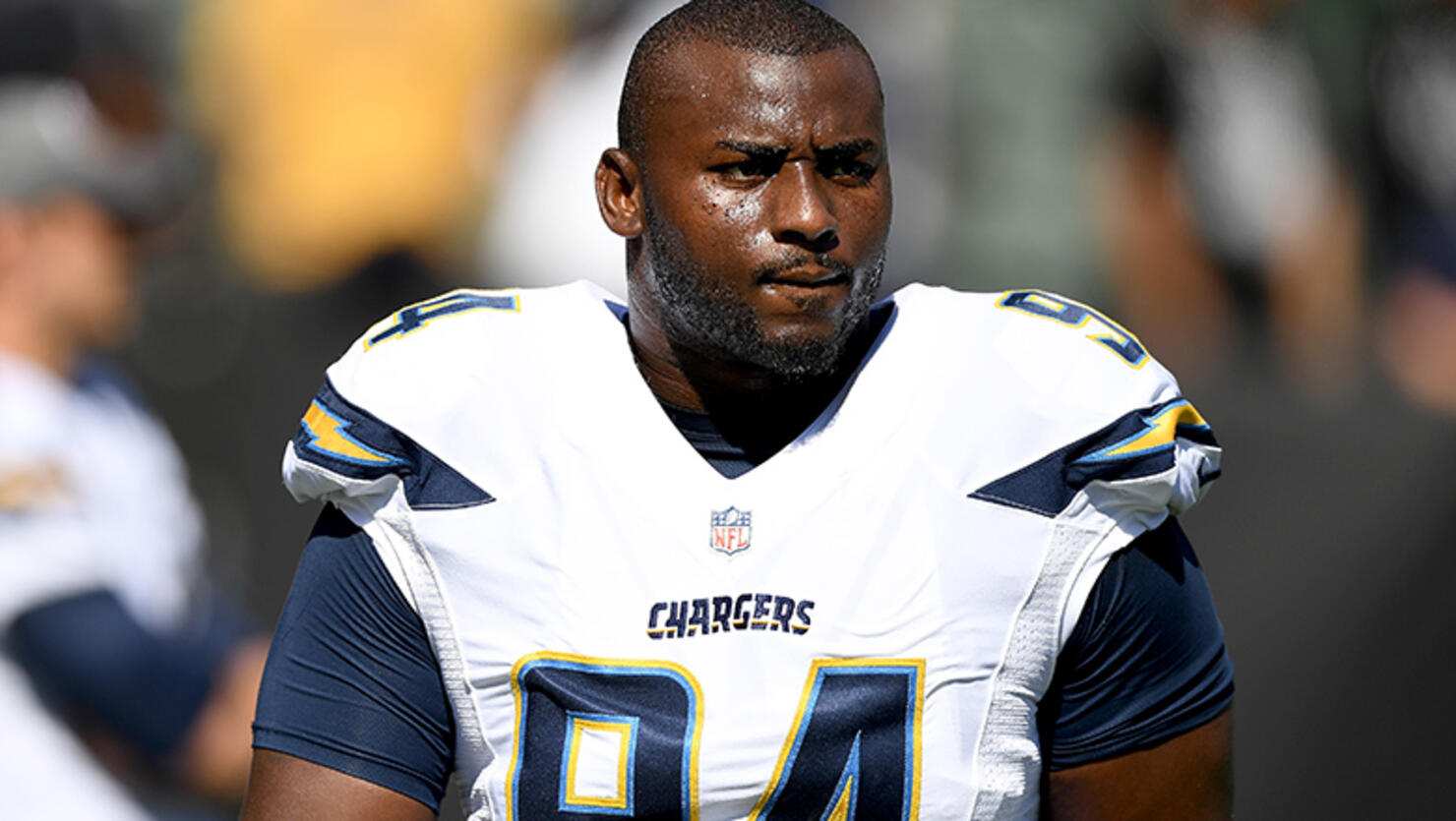 Corey Liuget #94 of the San Diego Chargers looks on during pregame warm ups prior to playing the Oakland Raiders