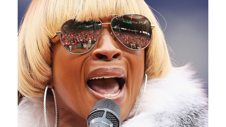 Toronto Blue Jays v Boston Red Sox BOSTON, MA - OCTOBER 02: Mary J. Blige sings the national anthem during the pregame ceremony to honor the retirement of David Ortiz #34 of the Boston Red Sox before his last regular season home game at Fenway Park on October 2, 2016 in Boston, Massachusetts. (Photo by Maddie Meyer/Getty Images)