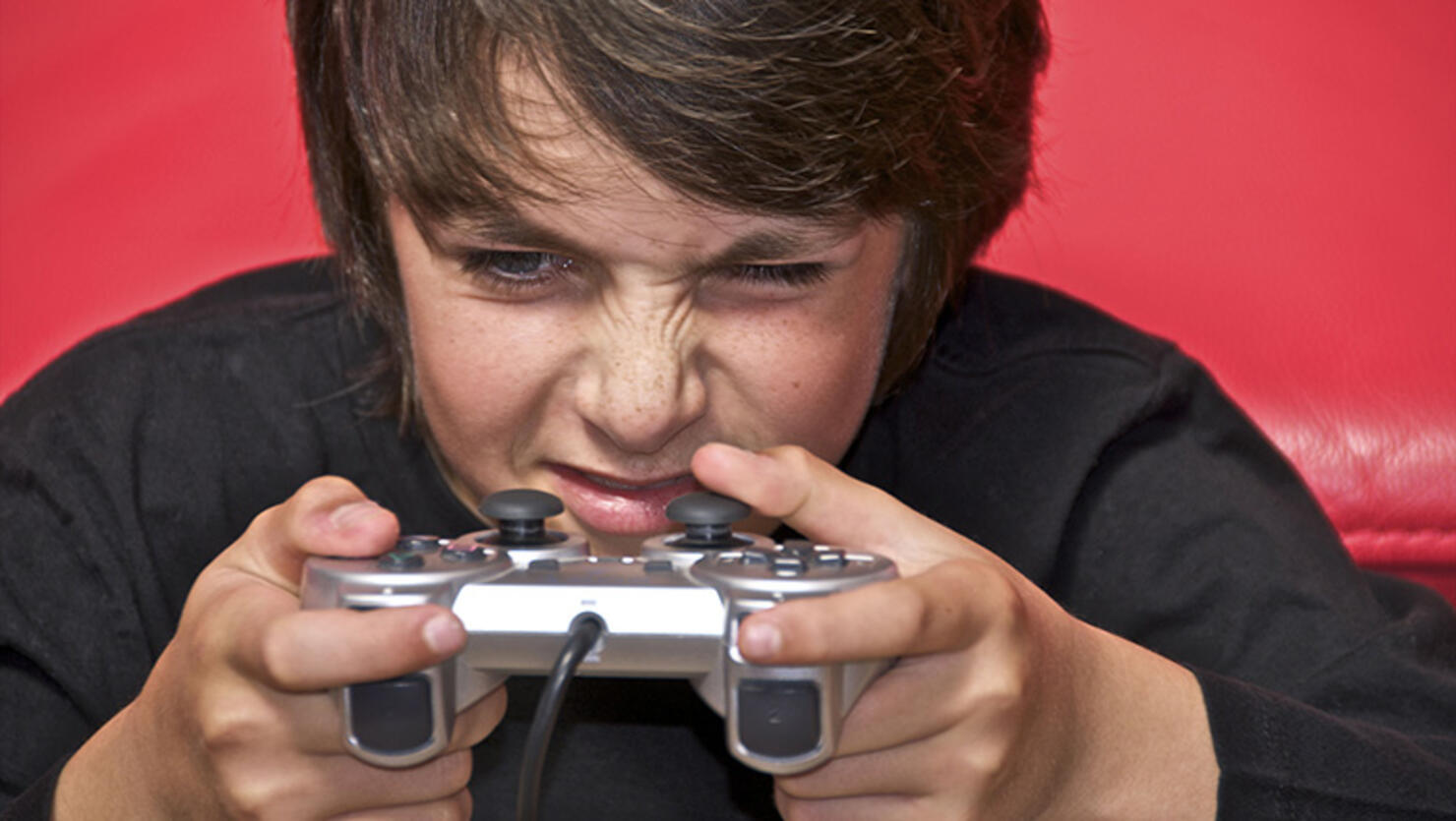 young boy playing video games